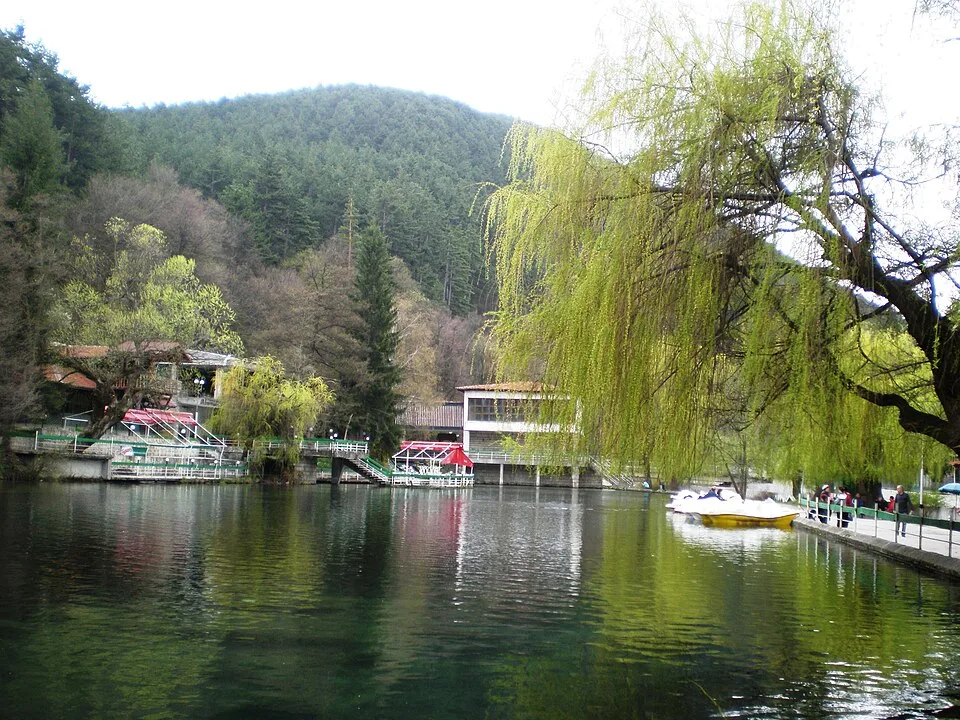 Kleptuza lake and wooded hills in Velingrad, Bulgaria